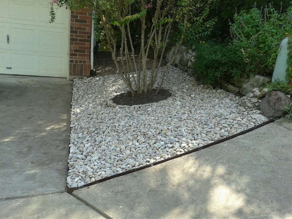 https://www.grassworksaustin.com/wp-content/uploads/2022/07/Grass-Works-Lawn-Care-Austin-Landscape-1.jpg